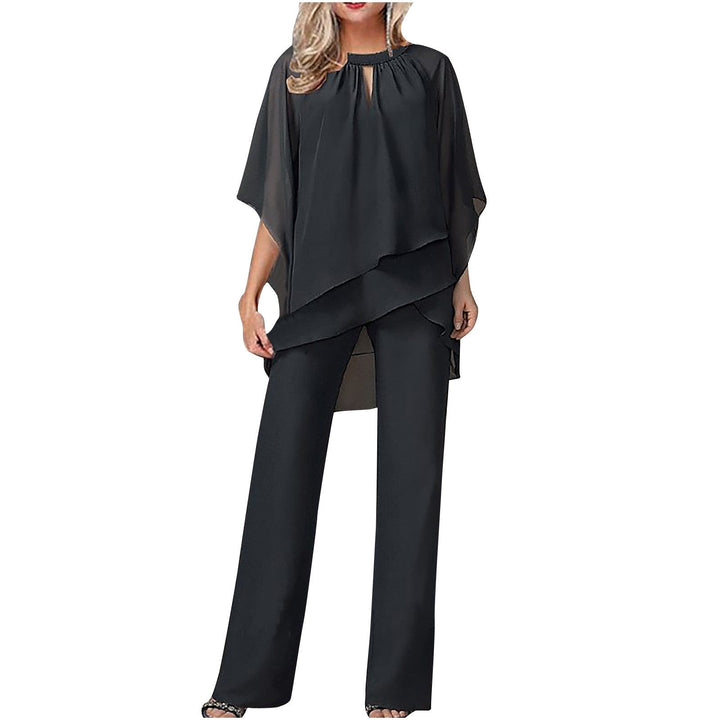 Elegant Kvinne Ensemble med Asymmetrisk Topp &amp; Bred Bukse