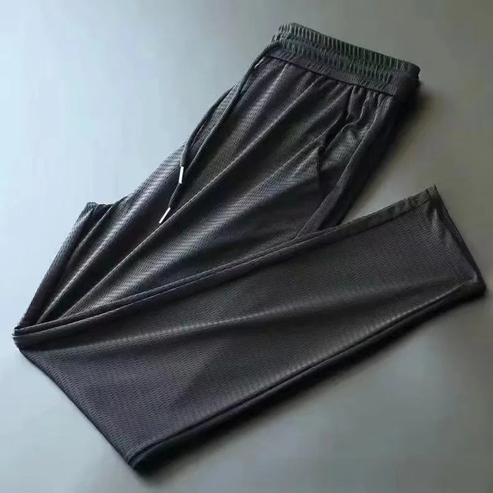 Herre Joggebukse med Glidelåslommer for Komfort og Stil